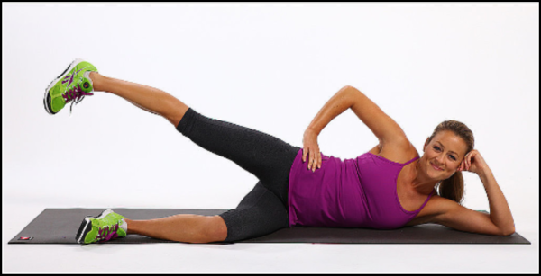 Image of woman performing a side-lying leg lift